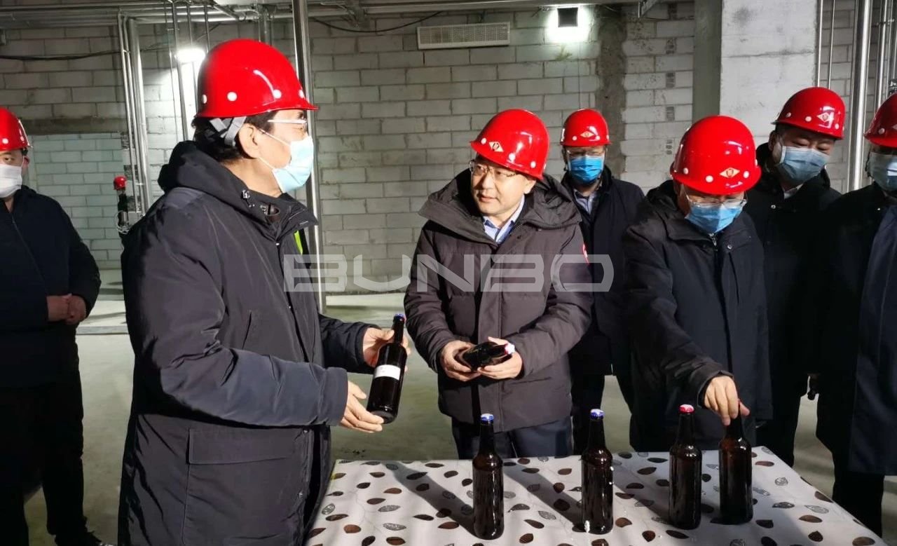 巴音朝鲁考察梅河口啤酒生态小镇